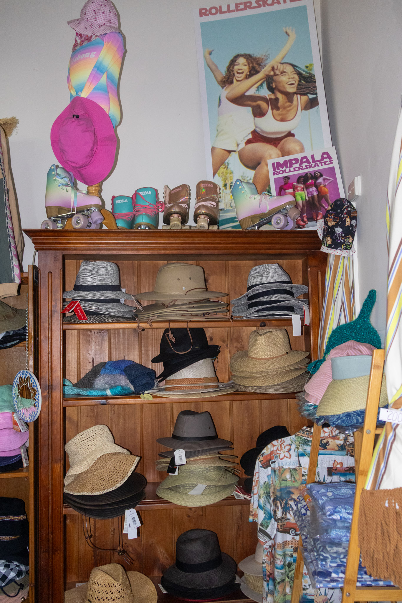 Hat display shelves inside the shop.